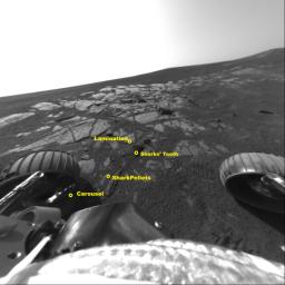 This image shows NASA's Mars Exploration Rover Opportunity's wheels and tracks in the extreme southwestern end of the outcrop in Meridiani Planum, Mars.