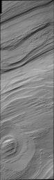 This image from NASA's 2001 Mars Odyssey released on March 8, 2004 shows Mars' south polar capt during the southern summer season. Layering in the South polar cap interior is readily visible and may indicate yearly ice/dust deposition.