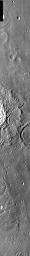 This image from NASA's 2001 Mars Odyssey released on March 22, 2004 shows tiny lines of craters on Mars created by the ejecta from a large crater to the left.