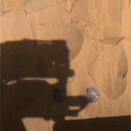 This panoramic camera image was taken by NASA's Mars Exploration Rover Spirit on after completing a two-location brushing on the rock dubbed 'Mazatzal.' A coating of fine, dust-like material was successfully removed from two targets.