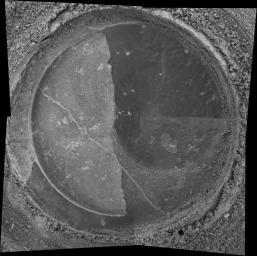 NASA's Mars Exploration Rover Spirit took the four images that make up this mosaic that reveals the drilled surface of the target called 'New York' on the rock dubbed 'Mazatzal.'