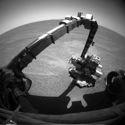 NASA's Mars Exploration Rover Opportunity used its robotic arm to examine 'Bounce Rock' during the rover's 67th sol on Mars, April 1, 2004.