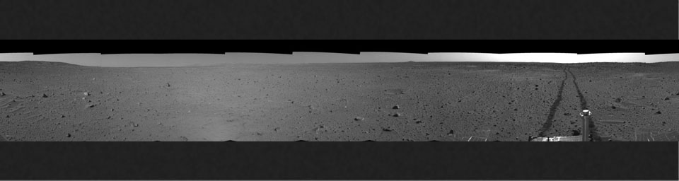 This cylindrical-projection mosaic was created from navigation camera images that NASA's Mars Exploration Rover Spirit acquired on sol 100 (April 14, 2004). It reveals Spirit's view after a century of sols on the martian surface.
