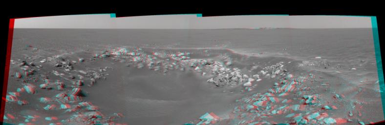 This 3-D cylindrical projection was taken by the navigation camera onboard NASA's Mars Exploration Rover Opportunity. This is a region dubbed 'Fram Crater' located .3 miles from 'Eagle Crater' and roughly 820 feet from 'Endurance Crater' (upper right).