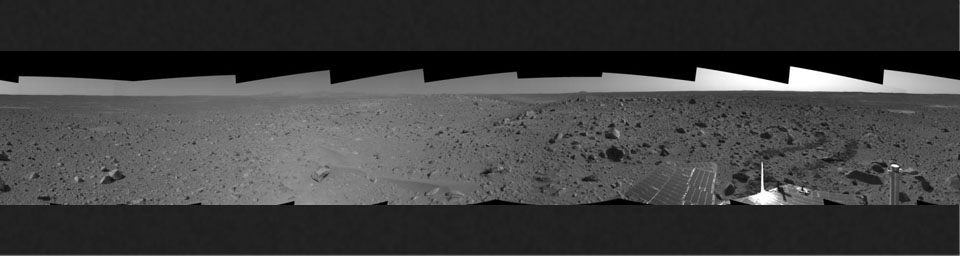 This cylindrical-projection mosaic was assembled from images taken by the navigation camera on the Mars Exploration Rover Spirit on sol 107 (April 21, 2004) at a region dubbed 'site 32.' Spirit is sitting east of 'Missoula Crater' on the outer plains.