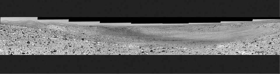 This mosaic was assembled from images taken by the panoramic camera on NASA's Mars Exploration Rover Spirit at a region dubbed 'site 31.' Spirit is looking at 'Missoula Crater.'
