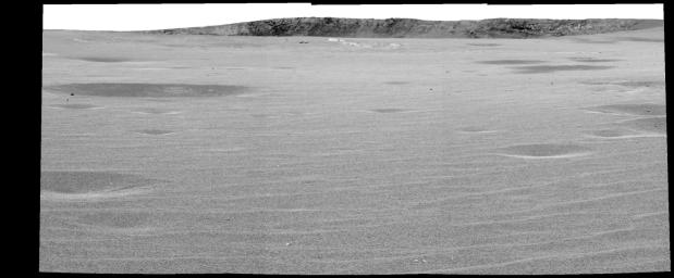 This image mosaic from NASA's Mars Exploration Rover Opportunity's panoramic camera was taken from a rover position of the rim of 