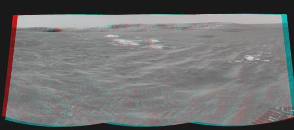 This anaglyph from NASA's Mars Rover Opportunity shows the rover's view of Meridiani Planum as it headed to Endurance Crater on Mars.