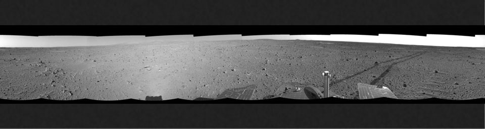 This right-eye mosaic was created from images that NASA's Mars Exploration Rover Spirit acquired May 6, 2004. Continuing its trek toward the 'Columbia Hills,' Spirit broke its record for the longest distance traveled in one Martian day.