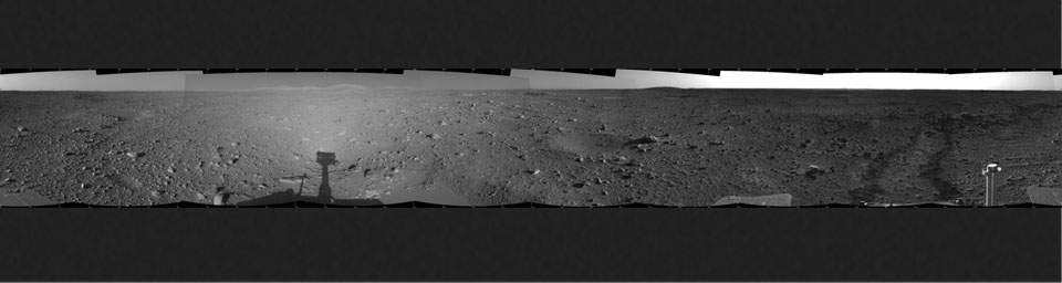 This cylindrical-projection mosaic was created from images that NASA's Mars Exploration Rover Spirit acquired May 7, 2004.The rover was on its way to the 'Columbia Hills,' which can be seen on the horizon.
