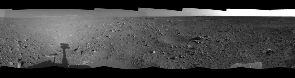 This left-eye mosaic was created from images that NASA's Mars Exploration Rover Spirit acquired May 7, 2004.The rover was on its way to the 'Columbia Hills,' which can be seen on the horizon.