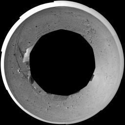 This polar-projection mosaic was created from images that NASA's Mars Exploration Rover Spirit acquired May 7, 2004.The rover was on its way to the 'Columbia Hills,' which can be seen on the horizon.