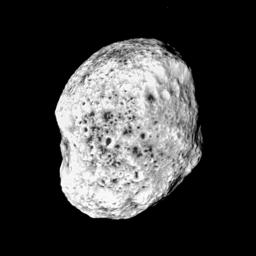 Saturn's moon, Hyperion, looking a bit like a sponge, pops into view in this image from NASA's Cassini spacecraft.