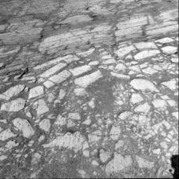 This view of rock layers exposed in the upper portion of the inner slope of 'Endurance Crater' was captured by NASA's Mars Exploration Rover Opportunity from the rover's position inside the crater during Opportunity's 134th sol on June 9, 2004.