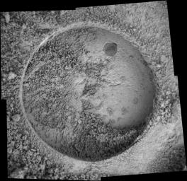 NASA's Mars Exploration Rover Opportunity took the images that make up this mosaic with its microscopic imager on June 14, 2004. The target is a rock called 'Tennessee,' which was drilled into by the rover's rock abrasion tool.
