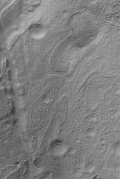 NASA's Mars Global Surveyor shows the banded southeastern floor of the giant impact basin, Hellas. Hellas Planitia is a large and varied region on Mars.