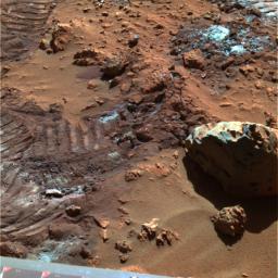 This false-color composite image highlights mysterious and sparkly dust-like material that is created when the soil in this region is disturbed. NASA's Mars Exploration Rover Spirit took this image on sol 165 in 'Hank's Hollow' (June 20, 2004).