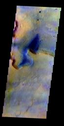 This false-color image released on May 31, 2004 from NASA's 2001 Mars Odyssey was collected May 29, 2002 during northern spring season. The image shows an area between Isidis Basin and Syrtis Major regions on Mars.