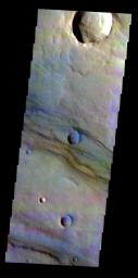 This false-color image released on June 8, 2004 from NASA's 2001 Mars Odyssey was collected September 5, 2003 during southern spring season. The image shows an area near the Thaumasia Planum region on Mars.