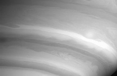 This image from NASA's Cassini spacecraft shows mesmerizing detail in the swirls and ribbons of air in Saturn's atmosphere.