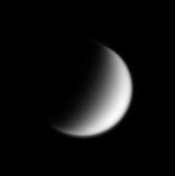 Saturn's planet-sized moon Titan displays a surprisingly flattened-looking north pole in this image captured by NASA's Cassini spacecraft.