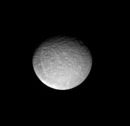 This image captured by NASA's Cassini spacecraft shows predominantly the impact-scarred leading hemisphere of Saturn's icy moon Rhea.