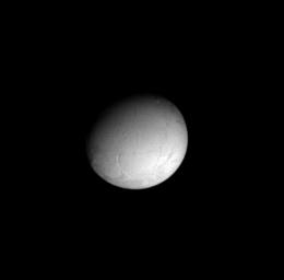 This image, taken by NASA's Cassini orbiter on Dec. 14, 2004, was its closest look yet at bright, icy Enceladus, centered on the moon's trailing hemisphere. It shows some of the linear features in the terrain of the Diyar Planitia region.