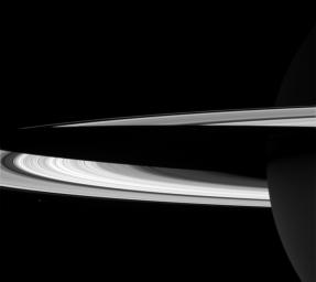 This image captured by NASA's Cassini spacecraft shows Saturn's shadow stretched across the sunlit southern surface of its rings.