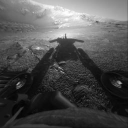 This self-portrait of NASA's Mars Exploration Rover Opportunity comes courtesy of the Sun and the rover's front hazard-avoidance camera. The dramatic snapshot of Opportunity's shadow was taken as the rover continues to move farther into Endurance Crater
