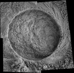 This microscopic imager mosaic of the target area called 'Diamond Jenness' was taken after NASA's Mars Exploration Rover Opportunity ground into the surface with its rock abrasion tool for a second time.