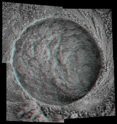 This 3-D, microscopic imager mosaic of a target area on a rock called 'Diamond Jenness' was taken after NASA's Mars Exploration Rover Opportunity ground into the surface with its rock abrasion tool for a second time. 3D glasses are necessary.