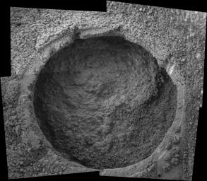 This image taken by NASA's Mars Exploration Rover Opportunity shows a target dubbed 'Tuktoyuktuk' on a rock called 'Inuvik' in 'Endurance Crater.' Opportunity dug a hole into the target with its rock abrasion tool.