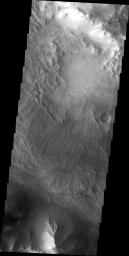 This image released on Sept 3, 2004 from NASA's 2001 Mars Odyssey shows Valles Marineris, the largest canyon in the solar system. If this canyon were on Earth, it would stretch from New York to Los Angeles. Seen here is a landslide in Ius Chasma.