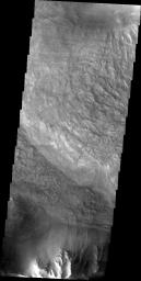 This image released on Sept 7, 2004 from NASA's 2001 Mars Odyssey shows Valles Marineris, the largest canyon in the solar system. If this canyon were on Earth, it would stretch from New York to Los Angeles. Seen here is a landslide in Ius Chasma.