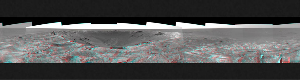 This 3D mosaic, created from images taken by NASA's Mars Exploration Rover Opportunity on sols 115 and 116 (May 21 and 22, 2004) provides a dramatic view of 'Endurance Crater.' 3D glasses are necessary to view this image.