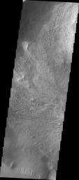 This image released on Sept 29, 2004 from NASA's 2001 Mars Odyssey shows a wind etched area on Mars in Candor Chasma.