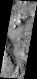 This image released on Oct 20, 2004 from NASA's 2001 Mars Odyssey shows Reull Vallis, located in the Martian southern highlands, just east of Hellas Basin.
