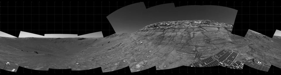 This image taken on Nov. 11, 2004, by NASA's Mars Exploration Rover Opportunity rock layers in the wall, with a portion of Opportunity's solar array visible at the bottom right.