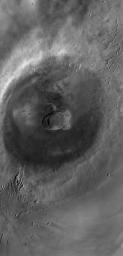 NASA's Mars Global Surveyor shows Ascraeus Mons, the northernmost of the three Tharsis Montes shield volcanoes on Mars.