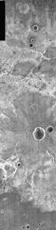This image from NASA's Mars Odyssey shows a crater is located east of Huygens Crater on Mars. The ballistically emplaced ejecta is a uniform gray tone.
