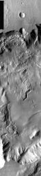 This image from NASA's Mars Odyssey shows a chaos region within Xanthe Terra on Mars. The landslide in this image is caused by the failure of steep slopes releasing material to form the landslide deposit.
