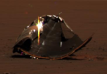 This image taken on Dec. 23, 2004 by NASA's Mars Exploration Rover Opportunity shows remains of the heat shield that protected the spacecraft as it barreled through the martian atmosphere.