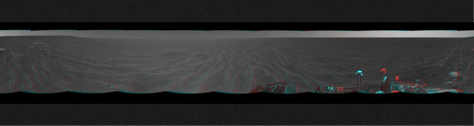 NASA's Mars Exploration Rover Opportunity was on its way from 'Endurance Crater' toward the spacecraft's jettisoned heat shield in this anaglyph. 3D glasses are necessary to view this image.