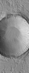 NASA's Mars Global Surveyor shows dark north polar dunes overlying other materials in the north polar region of Mars.