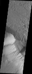 This image taken by NASA's Mars Odyssey shows Olympus Mons which contains a a feature type on Mars called a Mensa, from the Latin word for 'table.' A Mensa is a flat-topped prominence with cliff-like edges.