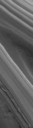 NASA's Mars Global Surveyor shows layered material of the north polar region of Mars.
