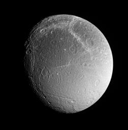 Dione's southern polar region contains fractures whose softened appearance suggests that they have different ages than the bright braided fractures seen in the image to the north. This image was taken with NASA's Cassini spacecraft on Aug. 1, 2005.