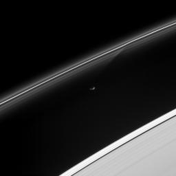 Prometheus has just passed and gravitationally disturbed some of the fine particulate material in the F ring, creating the sheared gap visible in the inner strands of the ring. The image was taken with NASA's Cassini spacecraft's narrow-angle camera.