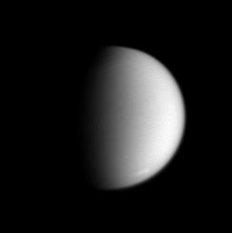This clear-filter view of Saturn's moon Titan reveals a region of cloud activity at high southern latitudes. This image was taken in visible light with NASA's Cassini spacecraft's narrow-angle camera on Aug. 31, 2005.