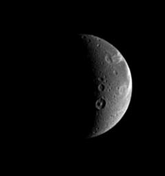 Naming features on other worlds, scientists like to follow themes, and Dione is no exception. Dione possesses numerous features with names from Virgil's 'Aeneid.' This image was taken in visible light with NASA's Cassini spacecraft taken on Aug. 25, 2005.